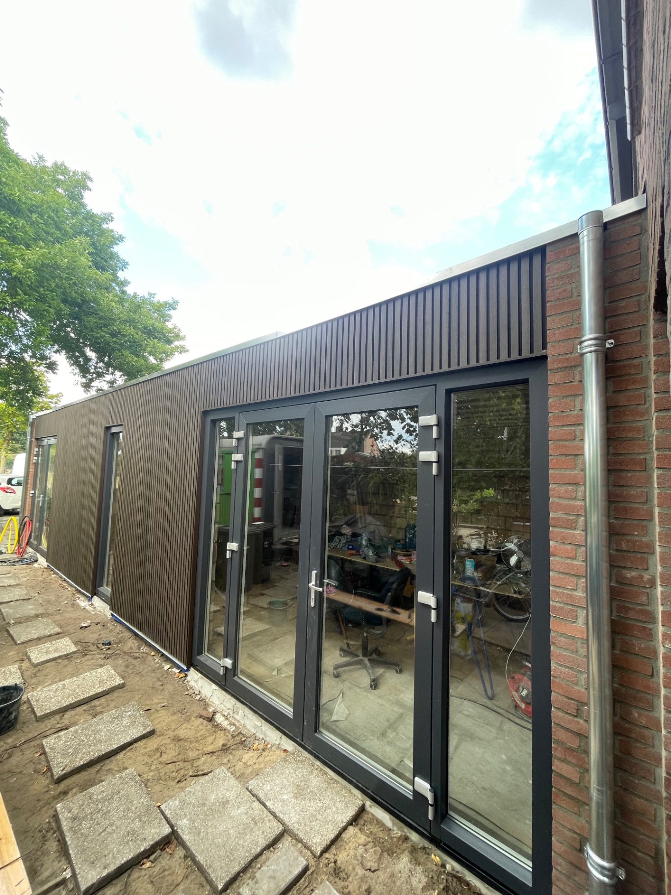 Van bestaande achterzijde naar complete woninguitbreiding – foto 9