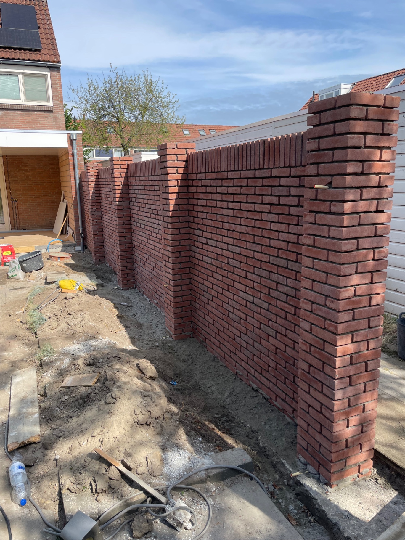Aanbouw en tuinmuur – foto 8